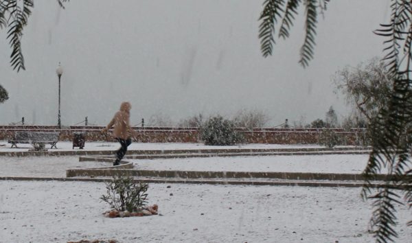 A Spanish lady experiencing snow for the first time