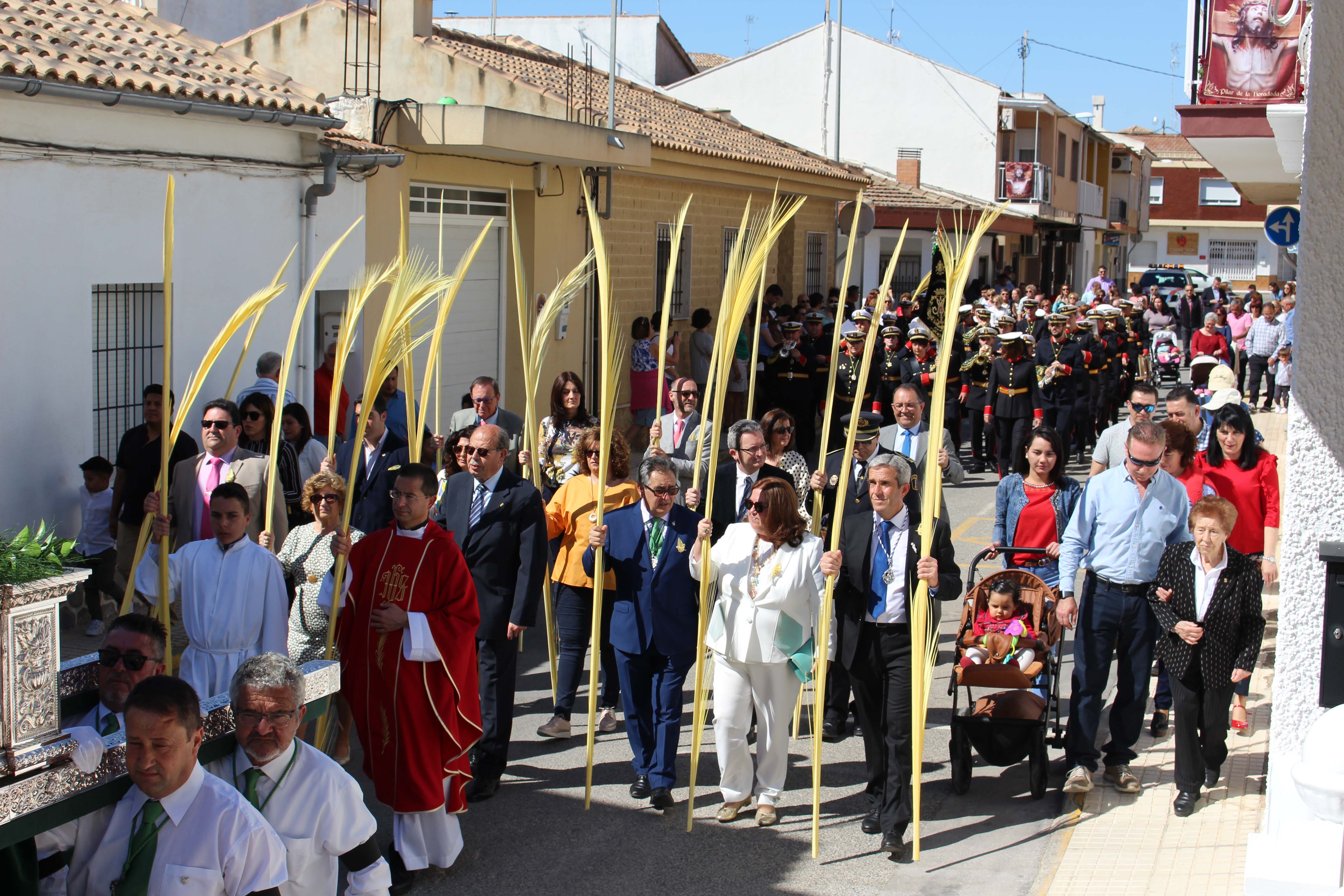 Palms and sunshine mark the start of Holy Week