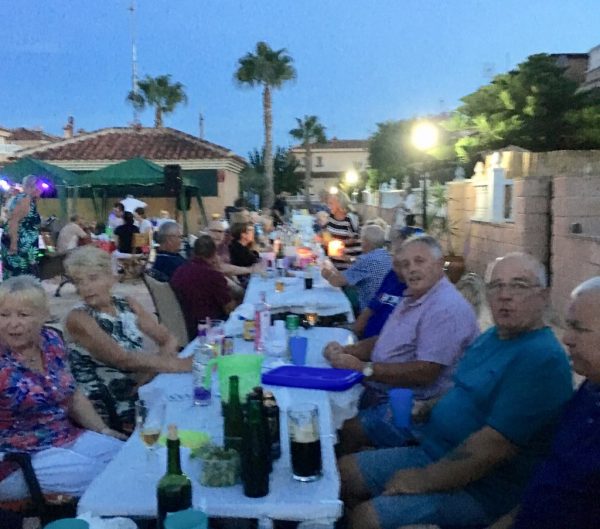 Spanish and English friends and neighbours enjoying the evening