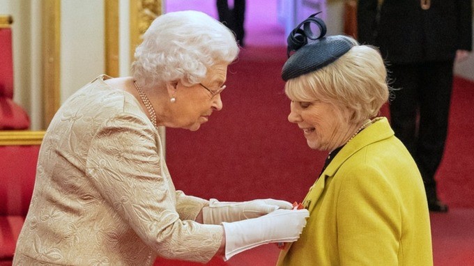 The Queen wore gloves as she awarded actress Wendy Craig with a CBE, prior to the COVID-19 lockdown in March.