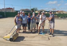 New Carpet for La Marina Bowls Club La Marina members preparing the green